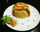 A picture of step 14 of Omurice.
