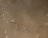 A picture of step 1 of Sabat mash ki dal/maah ki dal.