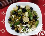 A picture of step 8 of Mixed Olives and Garlic Salad.