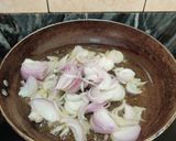 A picture of step 2 of KHAGINA (a savoury egg dish).