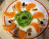 Foto del paso 4 de la receta: Desayuno saludable: kiwi, mandarina, nueces, pasas y miel