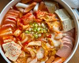 A picture of step 4 of Kimchi Army Stew (Budae Jjigae).