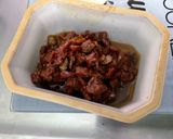 Une image de l'étape 9 de Aubergine et poivron aux tomates confites, coriandre et épices.