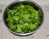 A picture of step 2 of Sarso Ka Saag (sarso, palak, bathua).