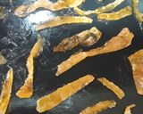 Foto del paso 3 de la receta: Cáscaras de pomelo confitado