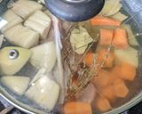 A picture of step 2 of Chicken bone carcass broth.