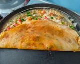 A picture of step 2 of Cheese Chilli Dosa.