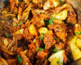 A picture of step 13 of Kathal Masala.