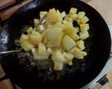 A picture of step 5 of Tawa Bhindi.