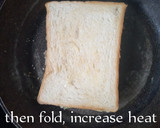 A picture of step 5 of Egg in Bread Toast.