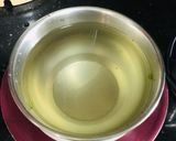 A picture of step 1 of Coriander Lemon Detox Drink.
