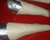 Foto del paso 3 de la receta: Conos con tapas de empanadas con un cono casero 
