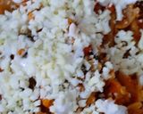 A picture of step 5 of Farfalle Pasta with cheese & Schezwan sauce.