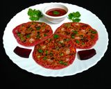 A picture of step 4 of Beetroot Uttapam.