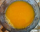 A picture of step 2 of Orange creamsicle poke cake.