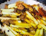 A picture of step 2 of Stir fried potatoes capsicum.