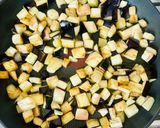 A picture of step 2 of Warm aubergine salad with giantwholewheat couscous and smoked cheese.