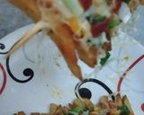 A picture of step 3 of French fries pizza.