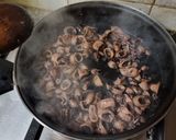 Foto del paso 3 de la receta Guiso de chipirones en su tinta
