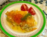 A picture of step 5 of Hake in the oven under a cheese crust.