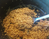 Foto del paso 5 de la receta: Arroz al horno con costillas, garbanzos, pimientos y ajos tierno