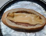 Foto del paso 5 de la receta: Volcán de pan con queso y algo más