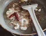 A picture of step 10 of Suji coconut balls.