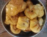 A picture of step 5 of Coconut Lobongo Lotika.