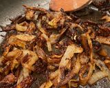 A picture of step 4 of Mdardara - brown lentils and rice with fried onions.