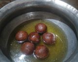 A picture of step 7 of Mawa Gulab Jamun from left over ghee residue.