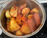 Foto del paso 5 de la receta: Patatas con costillas adobadas