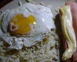 Foto del paso 5 de la receta: Arroz con salchichas y huevo