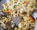 A picture of step 3 of Veg pulav (Leftover rice).