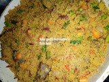 Fried couscous with spinach and egg sauce