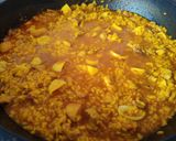A picture of step 5 of Chicken Paella.