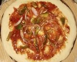 A picture of step 13 of Chicken Malai boti creamy floral pizza in pateela.