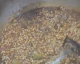 Foto del paso 7 de la receta Arroz meloso de alcachofas y conserva de pota en su tinta
