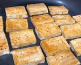 A picture of step 6 of Pan-Fried Tofu and Eggs with Oyster Sauce.