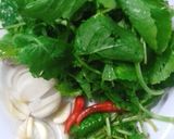 A picture of step 1 of Sarso Saag Bharta (Mustard Leaf Bharta).