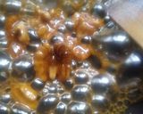 A picture of step 5 of Walnut date halwa with crunchy walnut.