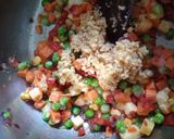 Foto del paso 2 de la receta: Timbal de arroz con mix de vegetales y cúrcuma 🥕🌽☘️🎊🌰🌶️🧄🫑