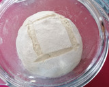 Foto del paso 7 de la receta: Hogaza de pan de ajo con masa madre