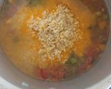A picture of step 3 of Weat and moong dal dalia.
