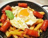 Foto del paso 7 de la receta Huevo frito con chistorra y patatas