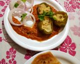 A picture of step 6 of Punjabi Paneer stuffed Capsicum in Red Gravy.