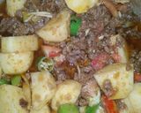 A picture of step 4 of Aloo qeema.