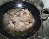 A picture of step 1 of Chicken yakhni pulao.