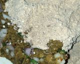 A picture of step 2 of Turai chhilka kofta with curry.