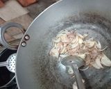 A picture of step 1 of Fried Tomato, Onion, and Garlic Chutney.