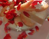 A picture of step 3 of Peach mousse, red roses and white flowers bouquet.